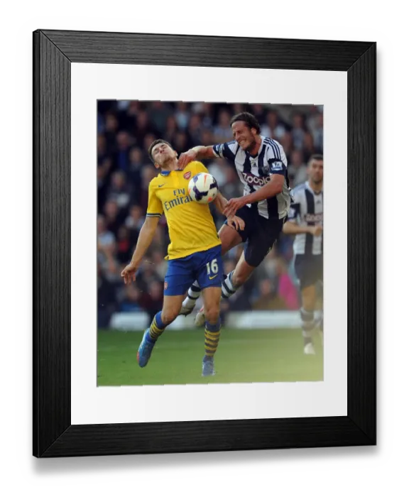 Framed Print : Aaron Ramsey vs. Jonas Olsson: Clash at The Hawthorns - West Bromwich Albion vs. Arsenal (2013-14)