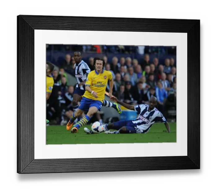 Framed Print : Arsenal vs. West Bromwich Albion: Premier League Clash at The Hawthorns (2013-14) Framed Print : Arsenal vs. West Bromwich Albion: Premier League Clash at The Hawthorns (2013-14)