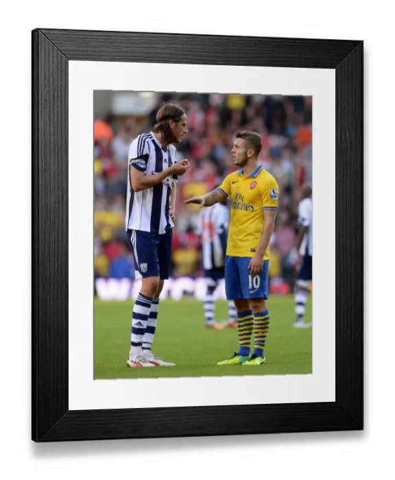 Framed Print : Jack Wilshere and Jonas Olsson: A Moment of Respite Amidst the West Bromwich Albion vs. Arsenal Rivalry (2013-14) Framed Print : Jack Wilshere and Jonas Olsson: A Moment of Respite Amidst the West Bromwich Albion vs. Arsenal Rivalry (2013-14)