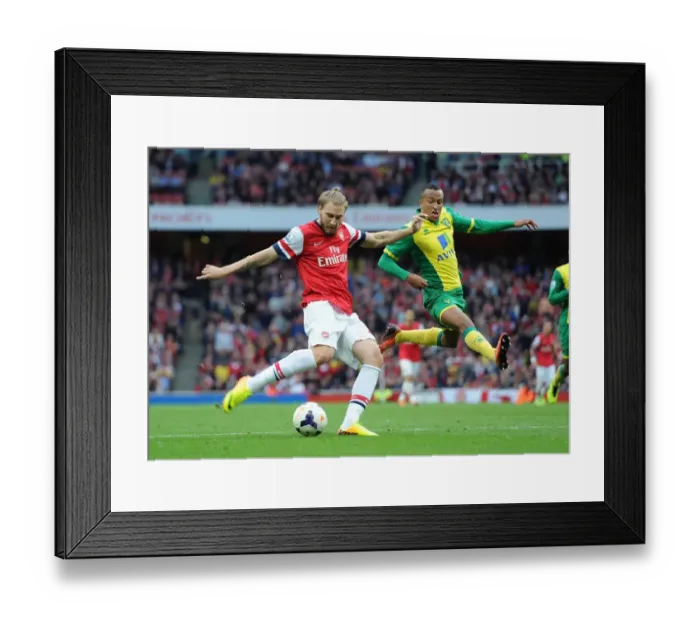 Framed Print : Arsenal vs Norwich: Bendtner vs Olsson - A Premier League Battle Framed Print : Arsenal vs Norwich: Bendtner vs Olsson - A Premier League Battle