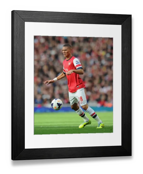 Framed Print : Arsenal's Kieran Gibbs in Action Against Norwich City (2013-14) Framed Print : Arsenal's Kieran Gibbs in Action Against Norwich City (2013-14)