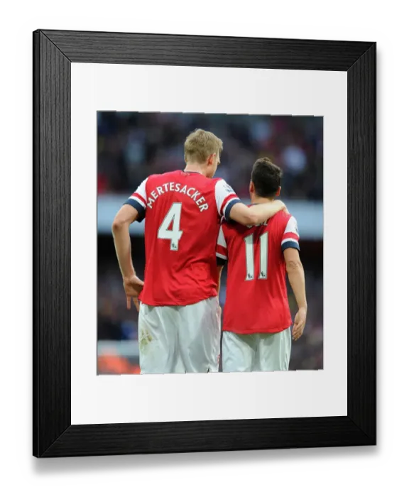 Framed Print : Mesut Ozil and Per Mertesacker Celebrate Arsenal's Victory: Arsenal v Norwich City, 2013-14 Framed Print : Mesut Ozil and Per Mertesacker Celebrate Arsenal's Victory: Arsenal v Norwich City, 2013-14