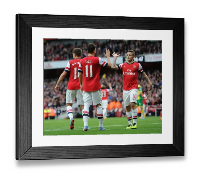 Framed Print : Mesut Ozil and Jack Wilshere Celebrate Goals: Arsenal's Dominance Over Norwich City (2013-14)