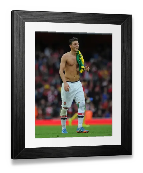 Framed Print : Mesut Ozil (Arsenal) after the match. Arsenal 4: 1 Norwich City. Barclays Premier League Framed Print : Mesut Ozil (Arsenal) after the match. Arsenal 4: 1 Norwich City. Barclays Premier League