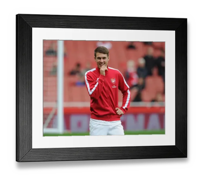 Framed Print : Aaron Ramsey: Arsenal's Focus before Clash against Norwich City (2013-14) Framed Print : Aaron Ramsey: Arsenal's Focus before Clash against Norwich City (2013-14)