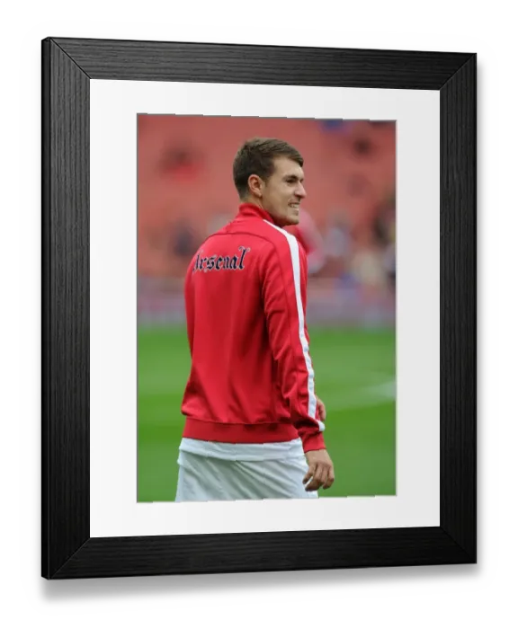 Framed Print : Aaron Ramsey (Arsenal). Arsenal 4: 1 Norwich City. Barclays Premier League. Emirates Stadium Framed Print : Aaron Ramsey (Arsenal). Arsenal 4: 1 Norwich City. Barclays Premier League. Emirates Stadium