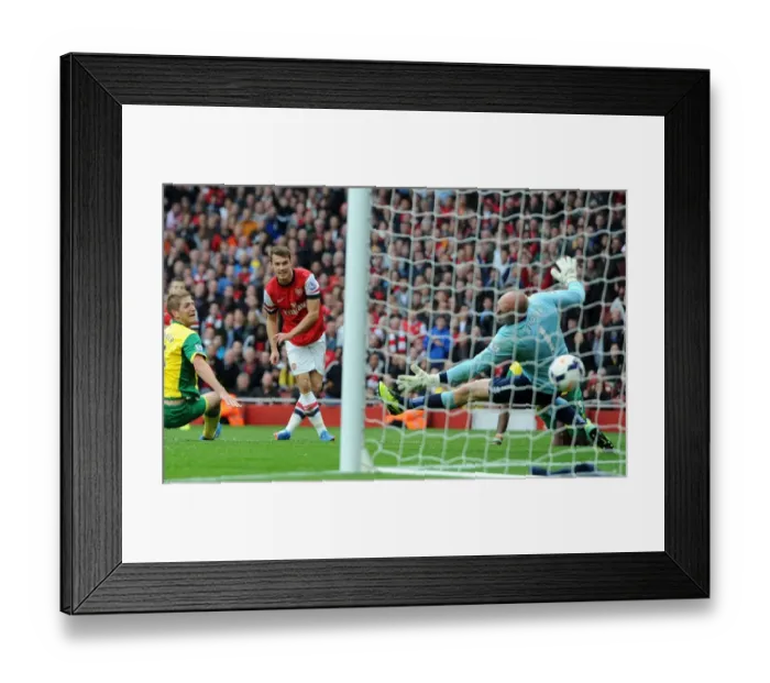 Framed Print : Aaron Ramsey Scores Stunner: Arsenal's 3rd Goal vs Norwich City (2013-14) Framed Print : Aaron Ramsey Scores Stunner: Arsenal's 3rd Goal vs Norwich City (2013-14)