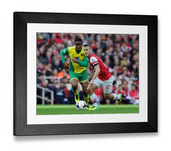 Framed Print : Clash of Midfielders: Jack Wilshere vs. Leroy Fer (Arsenal v Norwich City, 2013-14) Framed Print : Clash of Midfielders: Jack Wilshere vs. Leroy Fer (Arsenal v Norwich City, 2013-14)