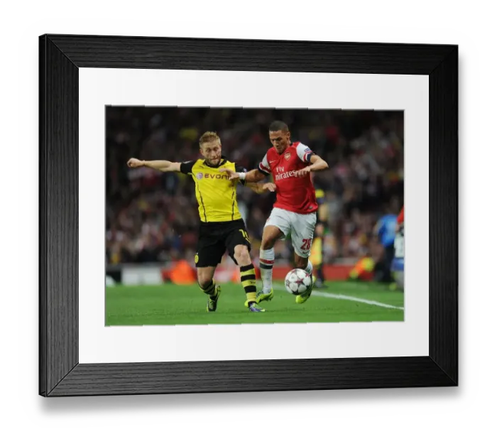 Framed Print : Arsenal's Kieran Gibbs Outmaneuvers Borussia Dortmund's Jakub Blaszczykowski Framed Print : Arsenal's Kieran Gibbs Outmaneuvers Borussia Dortmund's Jakub Blaszczykowski