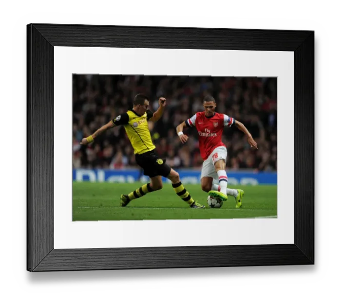 Framed Print : Arsenal vs. Borussia Dortmund: Kieran Gibbs vs. Kevin Grosskreutz Clash in the 2013-14 UEFA Champions League Framed Print : Arsenal vs. Borussia Dortmund: Kieran Gibbs vs. Kevin Grosskreutz Clash in the 2013-14 UEFA Champions League