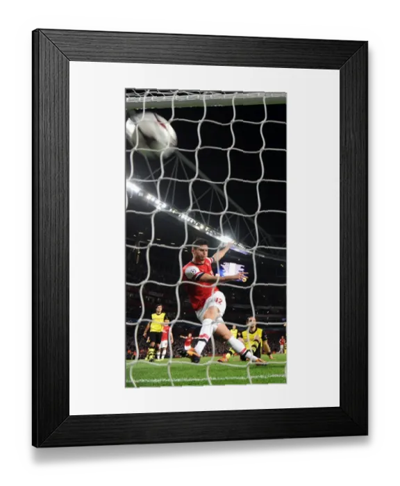 Framed Print : Olivier Giroud Scores the Winner: Arsenal vs. Borussia Dortmund, Champions League 2013-14