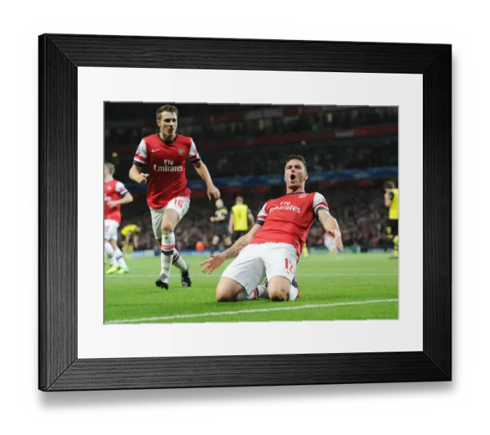 Framed Print : Arsenal's Unstoppable Partnership: Giroud and Ramsey's Goal Dance, 2013-14 UEFA Champions League