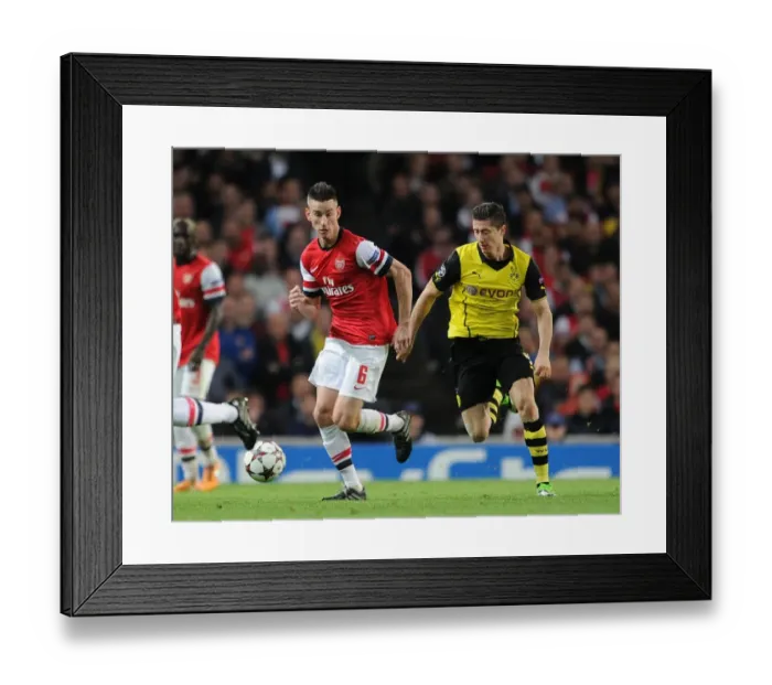 Framed Print : Clash of Titans: Koscielny vs. Lewandowski - Arsenal vs. Borussia Dortmund, UEFA Champions League