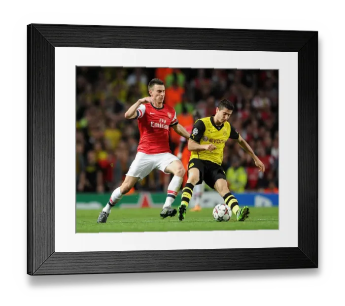 Framed Print : Clash of Titans: Koscielny vs. Lewandowski - Arsenal vs. Borussia Dortmund, UEFA Champions League