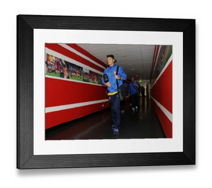 Framed Print : Mesut Ozil's Arrival: Arsenal vs Borussia Dortmund, UEFA Champions League (2013)