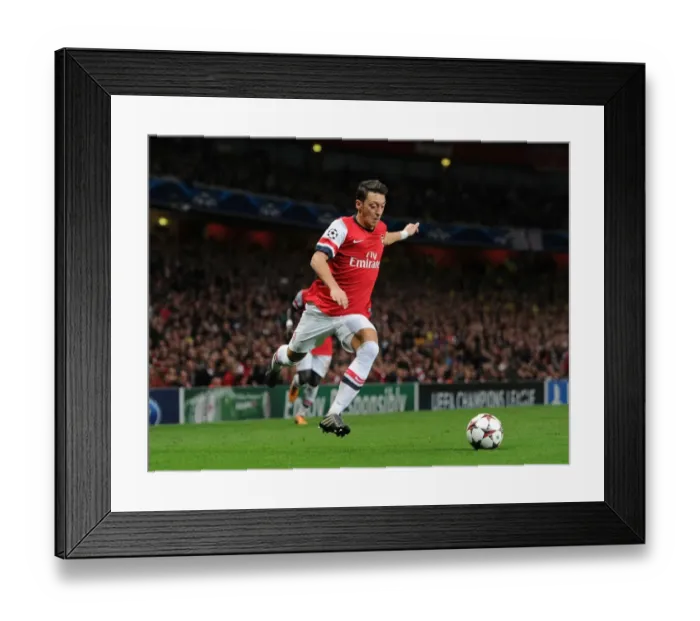 Framed Print : Mesut Ozil in Action: Arsenal vs Borussia Dortmund, UEFA Champions League (2013) Framed Print : Mesut Ozil in Action: Arsenal vs Borussia Dortmund, UEFA Champions League (2013)
