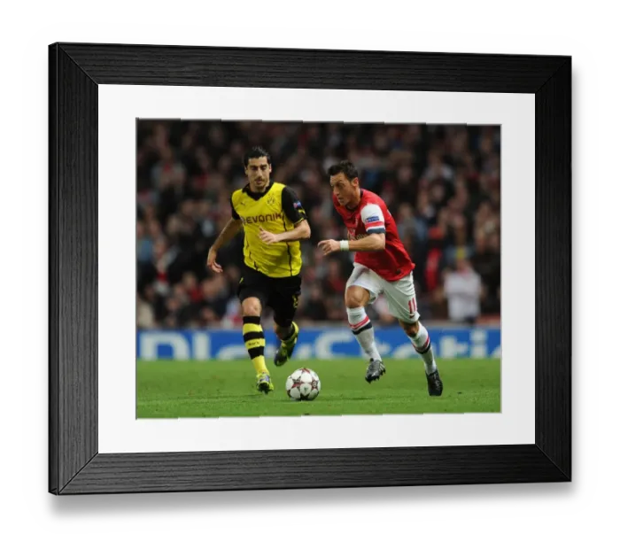 Framed Print : Mesut Ozil vs. Henrikh Mkhitaryan: Clash of the Playmakers - Arsenal v Borussia Dortmund, UEFA Champions League (2013)