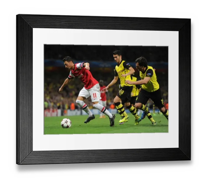 Framed Print : Clash of Talents: Ozil vs. Sahin & Hummels - Arsenal vs. Borussia Dortmund, UEFA Champions League
