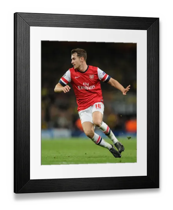 Framed Print : Arsenal vs Borussia Dortmund: UEFA Champions League Showdown at Emirates Stadium (2013-14)
