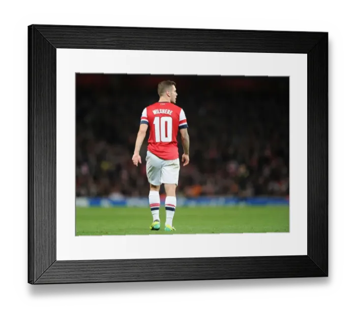 Framed Print : Jack Wilshere: Arsenal's Midfield Maestro Shines in UEFA Champions League Clash vs Borussia Dortmund (2013)