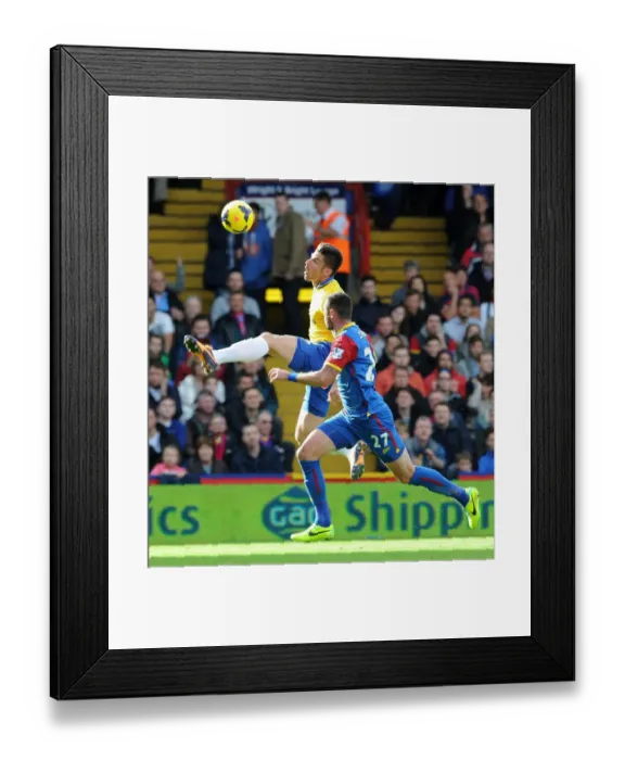 Framed Print : Olivier Giroud (Arsenal) Damien Delaney (Palace). Crystal Palace 0: 2 Arsenal. Barclays Framed Print : Olivier Giroud (Arsenal) Damien Delaney (Palace). Crystal Palace 0: 2 Arsenal. Barclays