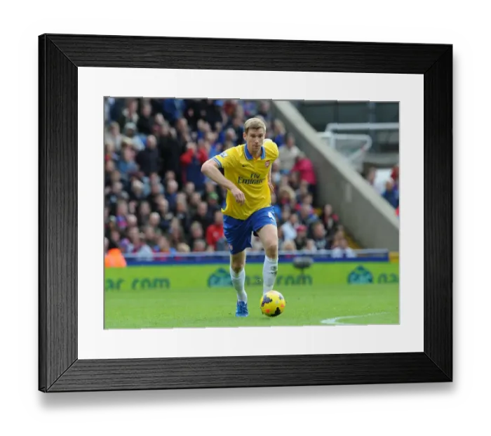 Framed Print : Per Mertesacker (Arsenal). Crystal Palace 0: 2 Arsenal. Barclays Premier League. Selhurst Park