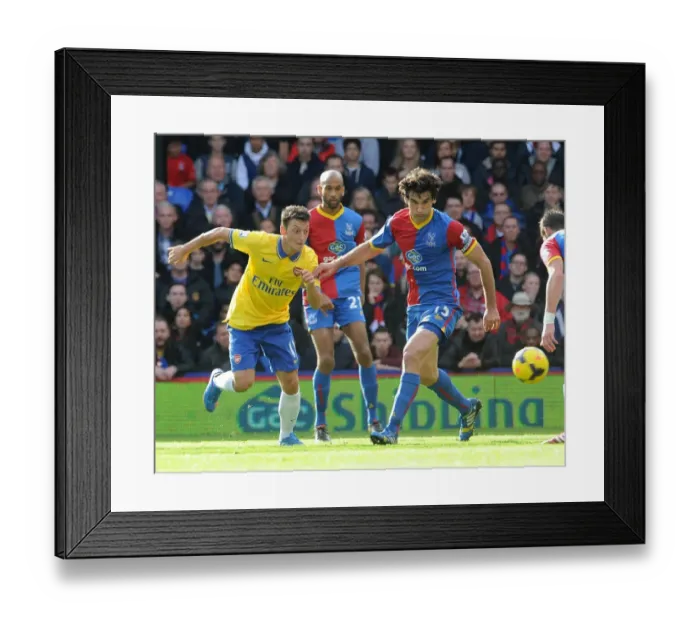 Framed Print : Mesut Ozil (Arsenal) Mile Jedinak (Palace). Crystal Palace 0: 2 Arsenal. Barclays Premier League