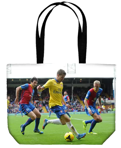 Aaron Ramsey (Arsenal) Mile Jadinak and Dean Moxey (Palace). Crystal Palace 0: 2 Arsenal