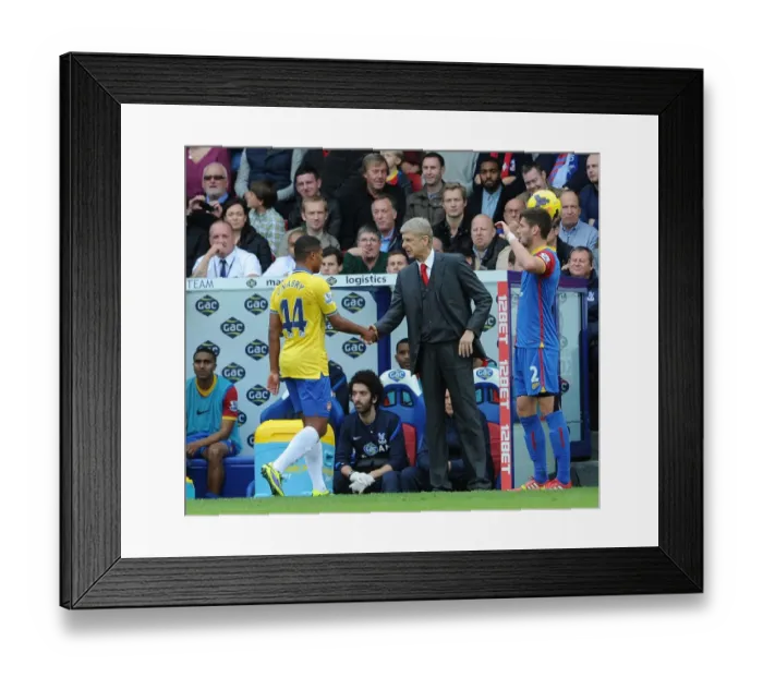 Framed Print : Arsene Wenger and Serge Gnabry: A Handshake at Crystal Palace (2013-14)