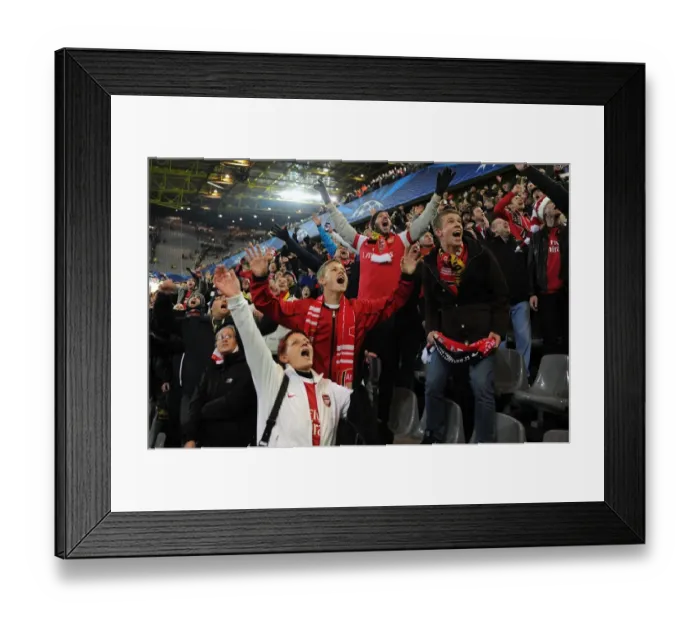 Framed Print : Arsenal Fans Celebrate Victory Over Borussia Dortmund in UEFA Champions League