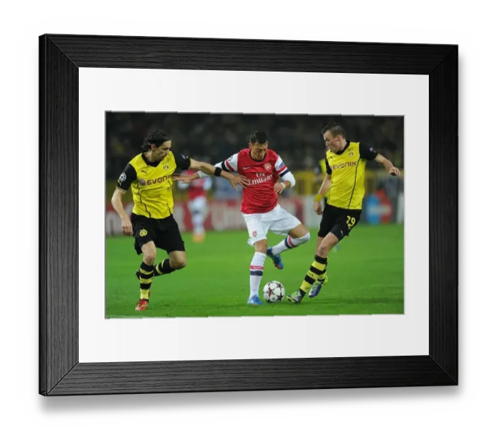 Framed Print : Mesut Ozil vs. Neven Subotic: A Battle in the 2013-14 Borussia Dortmund vs. Arsenal UEFA Champions League Match Framed Print : Mesut Ozil vs. Neven Subotic: A Battle in the 2013-14 Borussia Dortmund vs. Arsenal UEFA Champions League Match