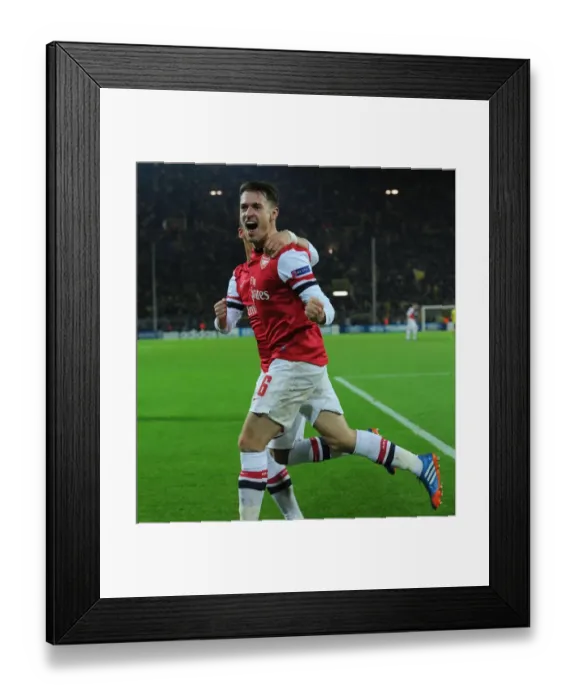 Framed Print : Unforgettable Moment: Ramsey and Ozil's Goal Celebration - Arsenal at Borussia Dortmund, UEFA Champions League (2013-14) Framed Print : Unforgettable Moment: Ramsey and Ozil's Goal Celebration - Arsenal at Borussia Dortmund, UEFA Champions League (2013-14)