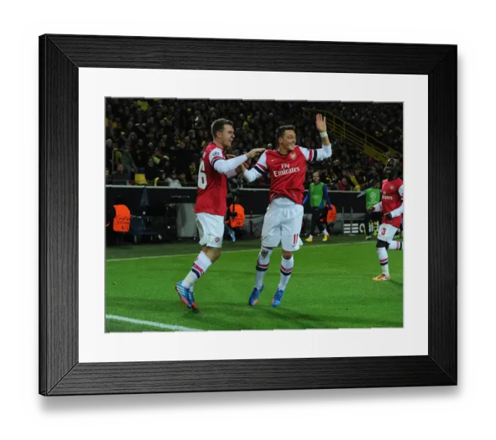 Framed Print : Unforgettable: Ramsey and Ozil's Epic Goal Celebration (Borussia Dortmund vs. Arsenal, UEFA Champions League, 2013-14)