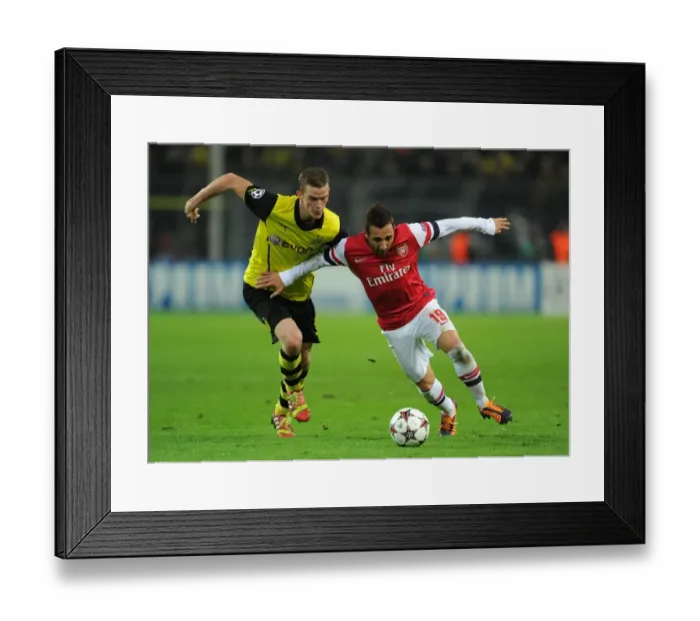 Framed Print : Clash of Midfield Titans: Santi Cazorla vs. Sven Bender (Arsenal vs. Borussia Dortmund, UEFA Champions League) Framed Print : Clash of Midfield Titans: Santi Cazorla vs. Sven Bender (Arsenal vs. Borussia Dortmund, UEFA Champions League)