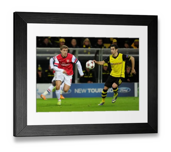 Framed Print : Monreal vs Mkhitaryan: A Champions League Showdown at Borussia Dortmund's Signal Iduna Park Framed Print : Monreal vs Mkhitaryan: A Champions League Showdown at Borussia Dortmund's Signal Iduna Park