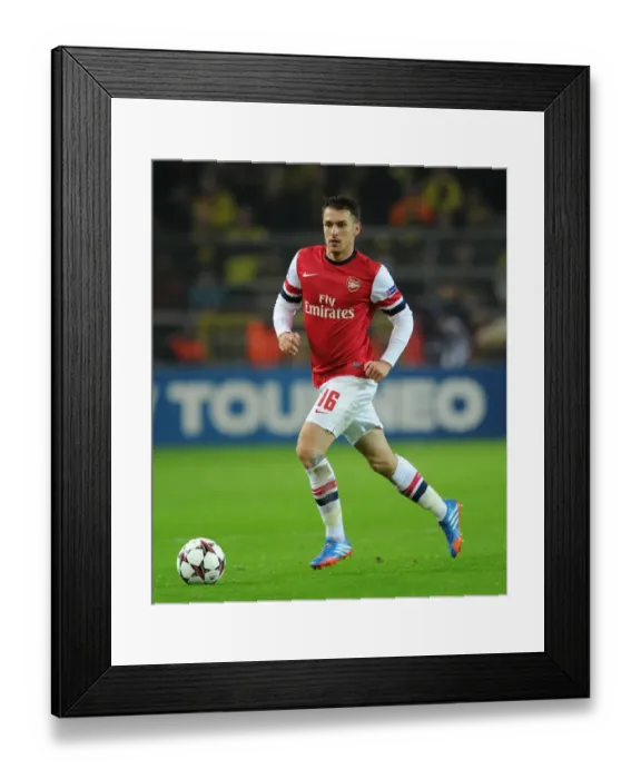 Framed Print : Aaron Ramsey in Action: Arsenal vs. Borussia Dortmund, UEFA Champions League (2013-14) Framed Print : Aaron Ramsey in Action: Arsenal vs. Borussia Dortmund, UEFA Champions League (2013-14)