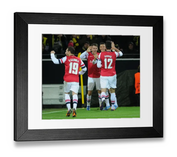 Framed Print : Ramsey, Ozil, and Giroud's Goal Celebration: Borussia Dortmund vs. Arsenal, UEFA Champions League (2013-14) Framed Print : Ramsey, Ozil, and Giroud's Goal Celebration: Borussia Dortmund vs. Arsenal, UEFA Champions League (2013-14)