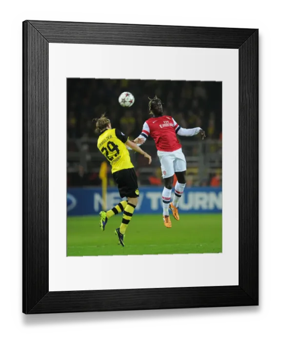 Framed Print : Clash of Titans: Sagna vs. Schmelzer - Borussia Dortmund vs. Arsenal, UEFA Champions League (2013)