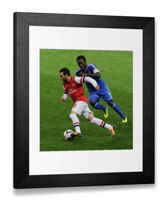 Framed Print : Arsenal's Santi Cazorla Outmaneuvers Chelsea's Michael Essien Framed Print : Arsenal's Santi Cazorla Outmaneuvers Chelsea's Michael Essien
