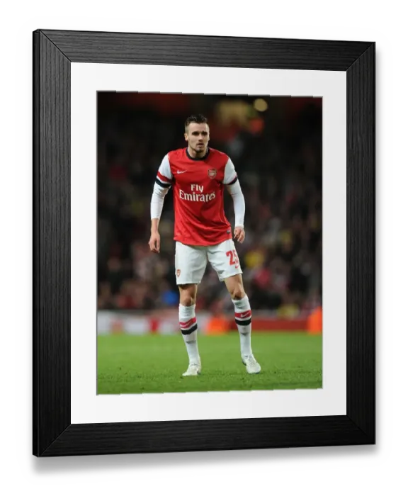 Framed Print : Arsenal vs Chelsea: Carl Jenkinson in Action at the Emirates Stadium - Capital One Cup 2013-14