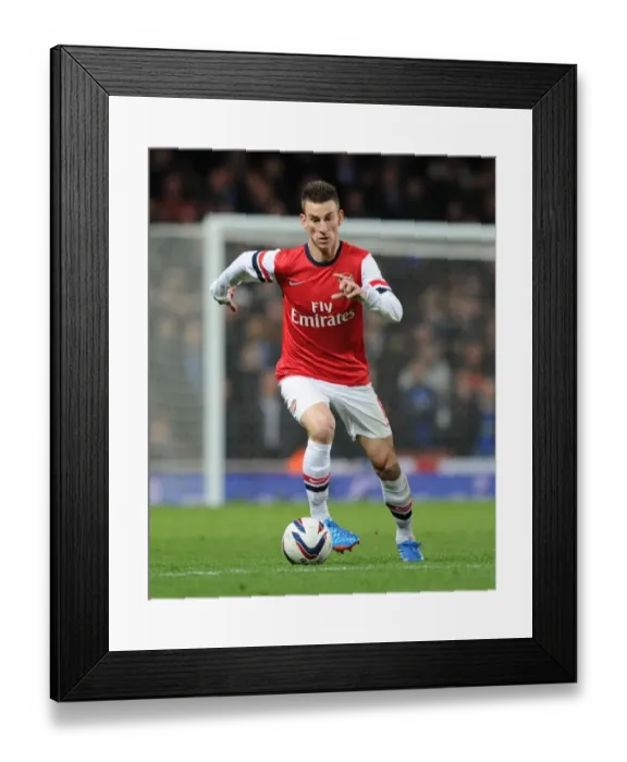 Framed Print : Arsenal's Laurent Koscielny in Action Against Chelsea - Capital One Cup 2013-14