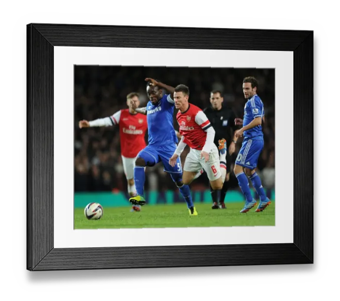 Framed Print : Arsenal vs. Chelsea: Koscielny Faces Off Against Essien and Mata in the Capital One Cup Framed Print : Arsenal vs. Chelsea: Koscielny Faces Off Against Essien and Mata in the Capital One Cup