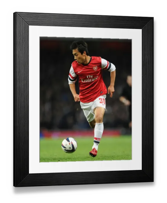 Framed Print : Arsenal's Ju Young Park Faces Off Against Chelsea in Capital One Cup