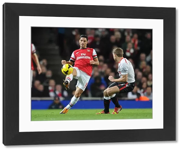 Mikel Arteta (Arsenal) Steven Gerrard (Liverpool). Arsenal 2: 0 Liverpool. Barclays Premier League