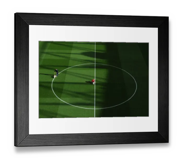 Framed Print : Arsenal vs Liverpool: Behind the Scenes - Pre-Match Pitch Preparation, 2013-14, Emirates Stadium