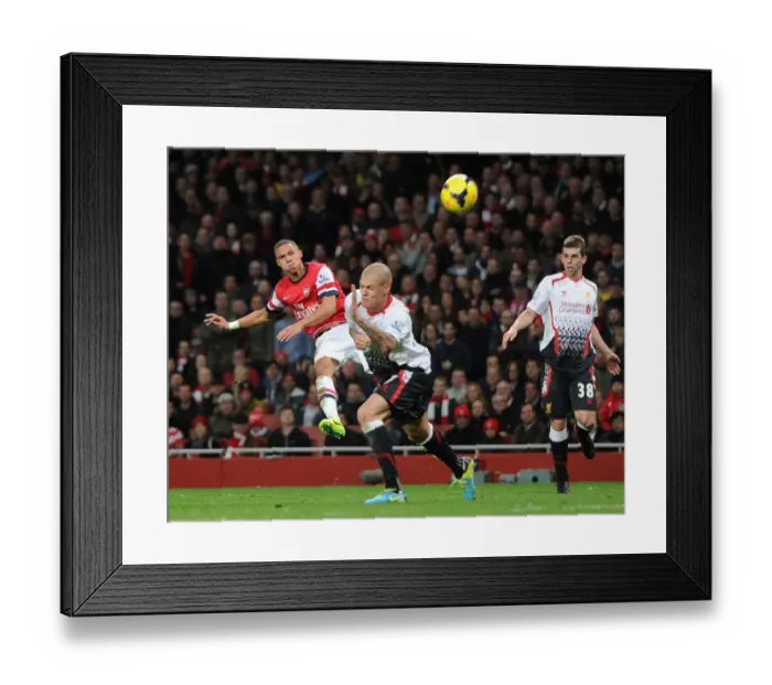 Framed Print : Kieran Gibbs (Arsenal) Martin Skrtel (Liverpool). Arsenal 2: 0 Liverpool. Barclays Premier League