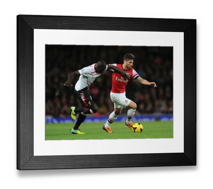 Framed Print : Clash of Titans: Giroud vs. Sakho - Arsenal vs. Liverpool, Premier League 2013-14: A Battle of Strength and Skill