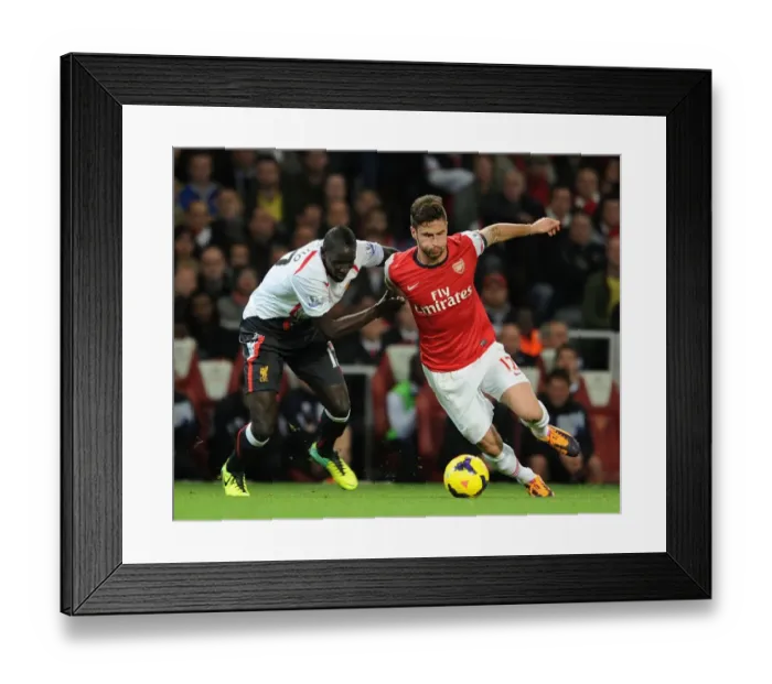 Framed Print : Giroud vs. Sakho: Intense Battle at the Emirates - Arsenal v Liverpool, 2013-14 Premier League