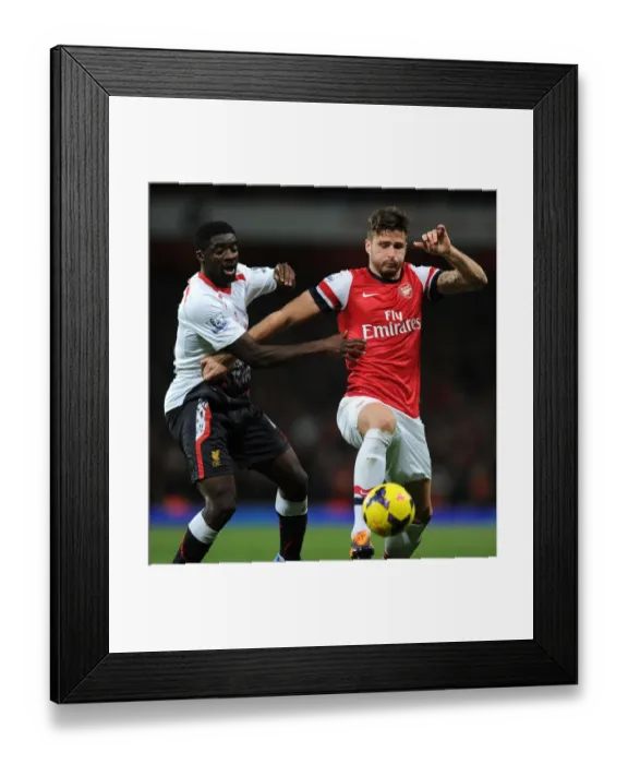 Framed Print : Arsenal vs. Liverpool: Olivier Giroud vs. Kolo Toure - Intense Battle in the 2013-14 Premier League Framed Print : Arsenal vs. Liverpool: Olivier Giroud vs. Kolo Toure - Intense Battle in the 2013-14 Premier League