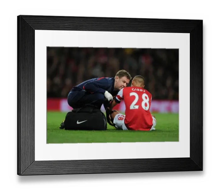 Framed Print : Arsenal v Liverpool: Kieran Gibbs Sidelined by Injury Framed Print : Arsenal v Liverpool: Kieran Gibbs Sidelined by Injury